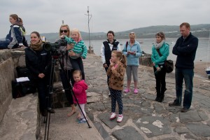 Everyone having a go with the Digiscope out on the pier